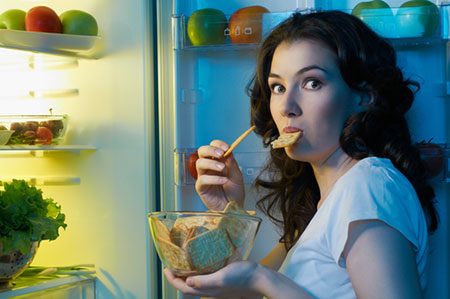 Woman Snacking At Night Because She Didn't Have Her Green Tea